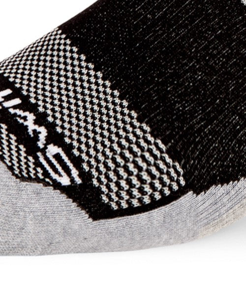 Close-up of a black and gray sock with Swiftwick logo and textured pattern.